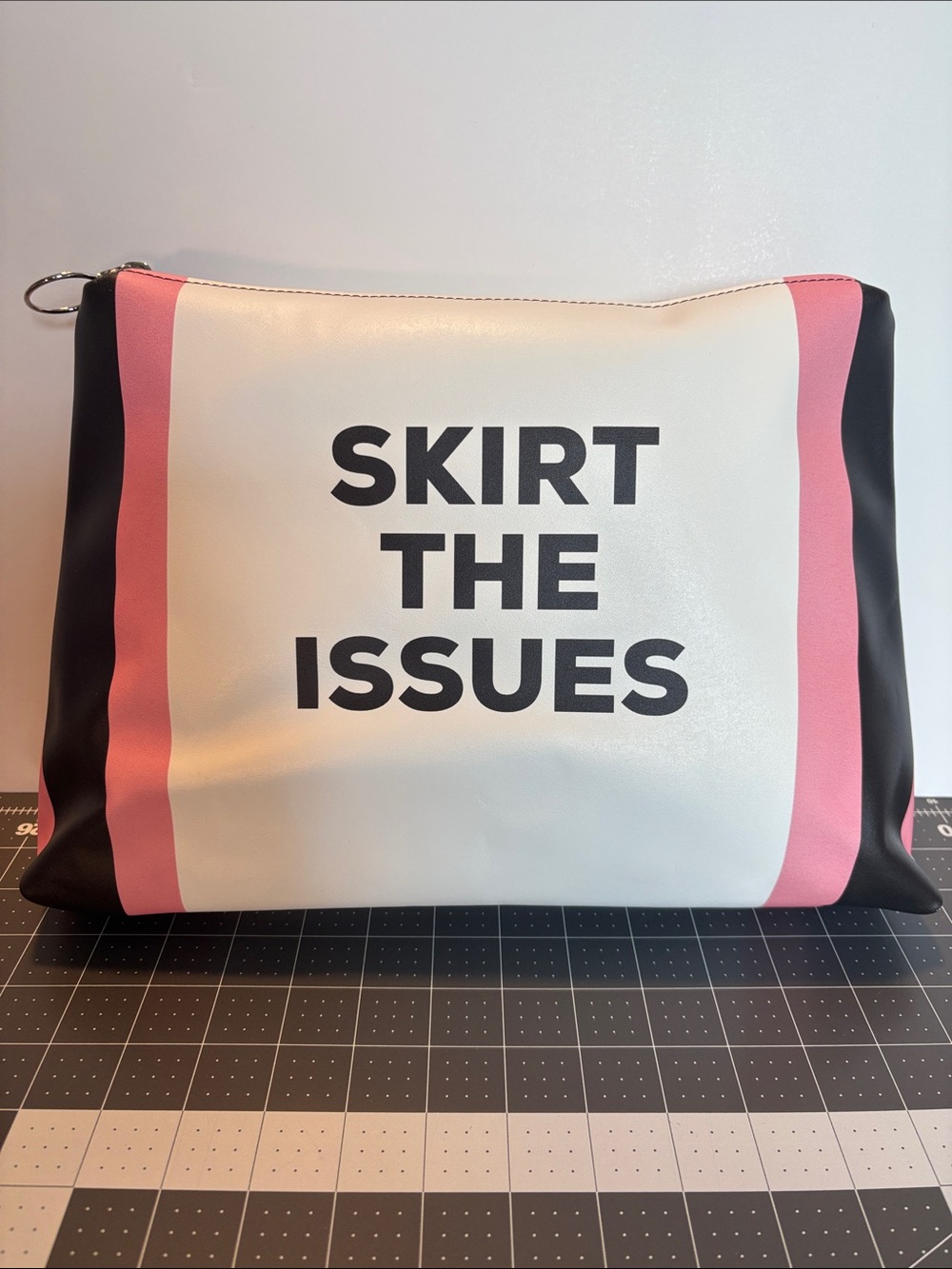 “Skirt the Issues” Leather Clutch
